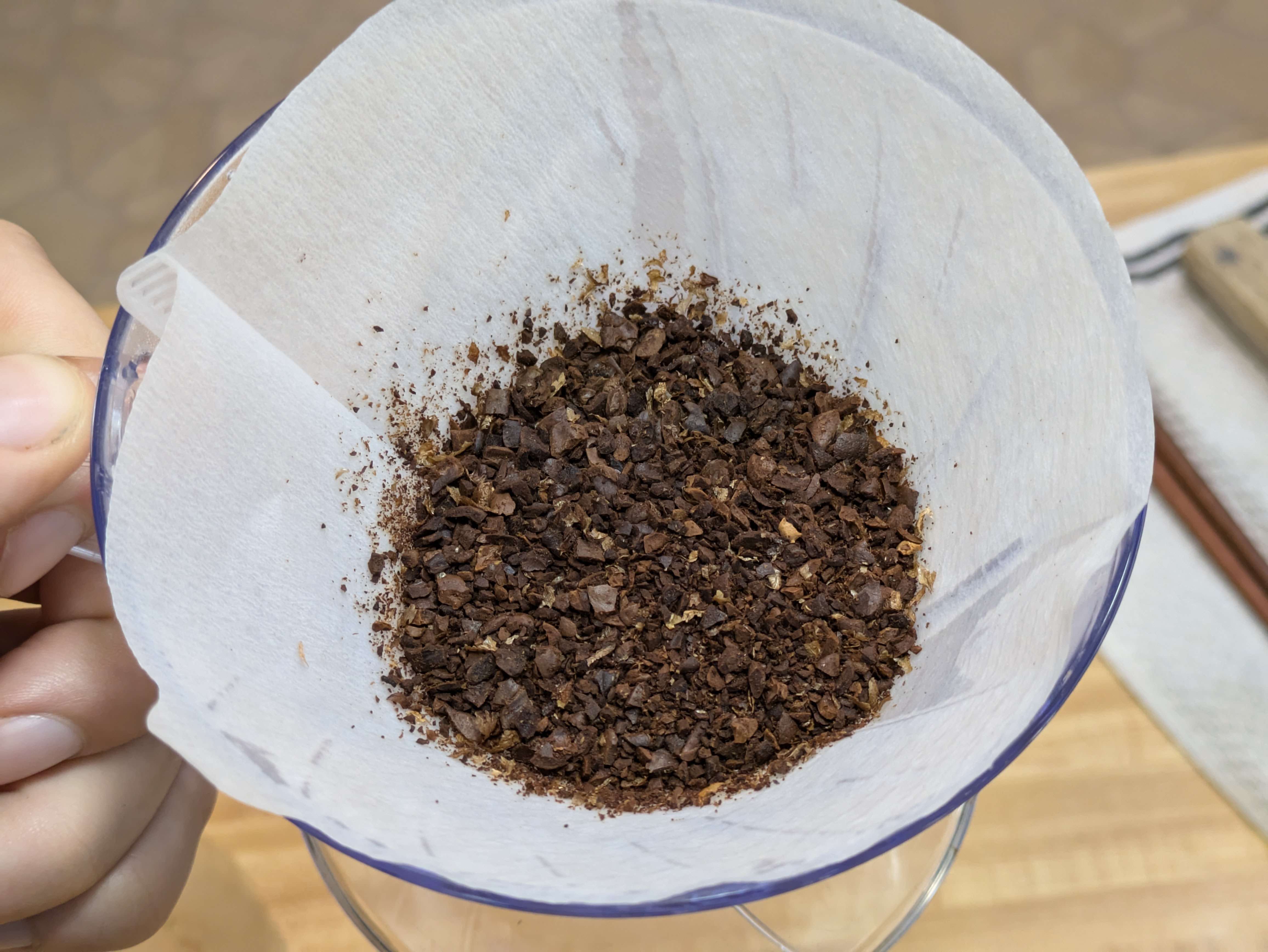 grinded coffee,
           held in a paper filter in a V60 brewer